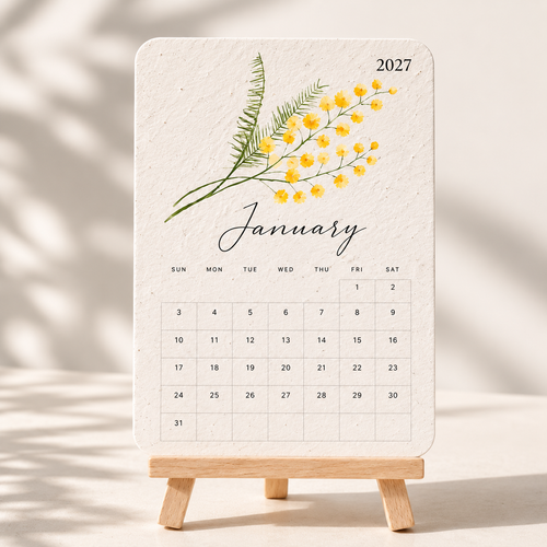 2027 plantable seed paper calendar displayed with wooden stand