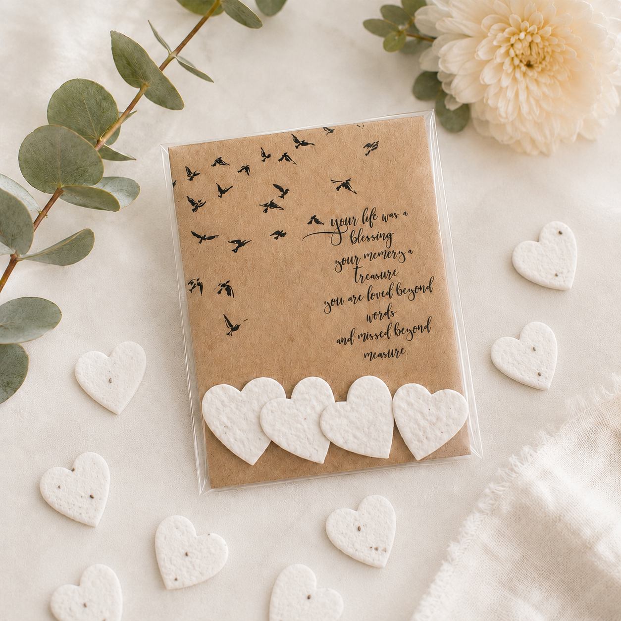 Celebration of life favours with personalised remembrance card and wildflower hearts for celebration of life keepsakes