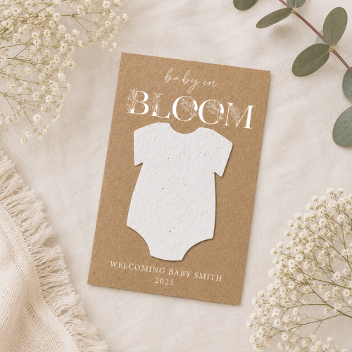 Plantable onesie baby shower favour made from wildflower seed paper on personalised Baby in Bloom card