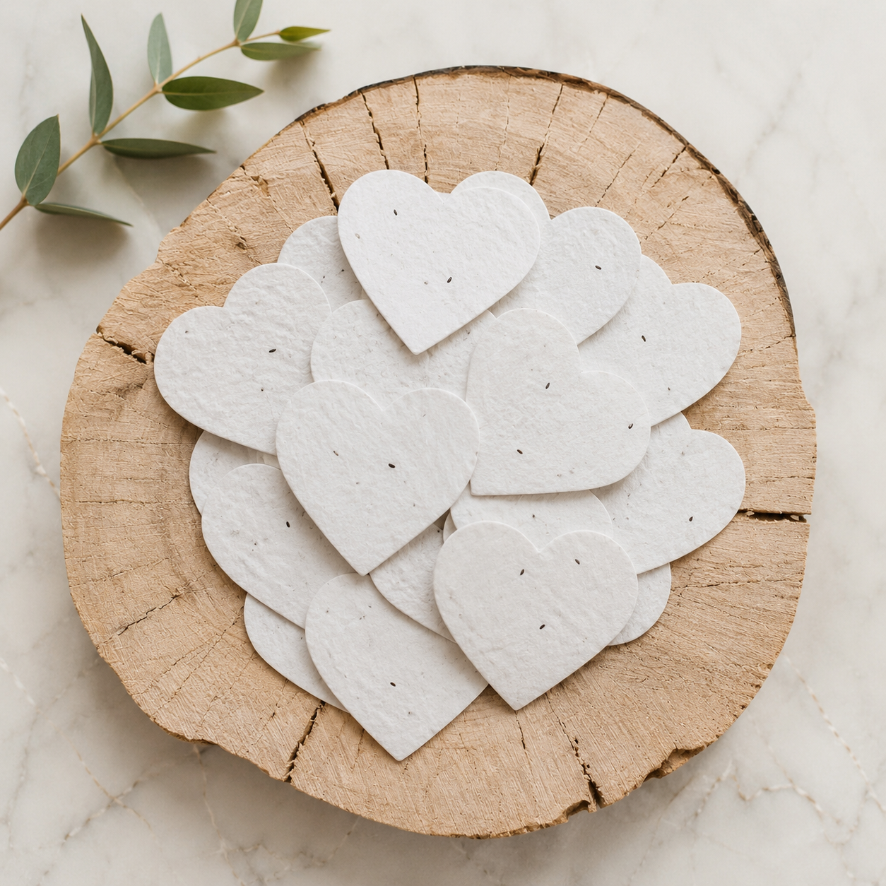 Natural recycled seed paper with visible wildflower seeds
