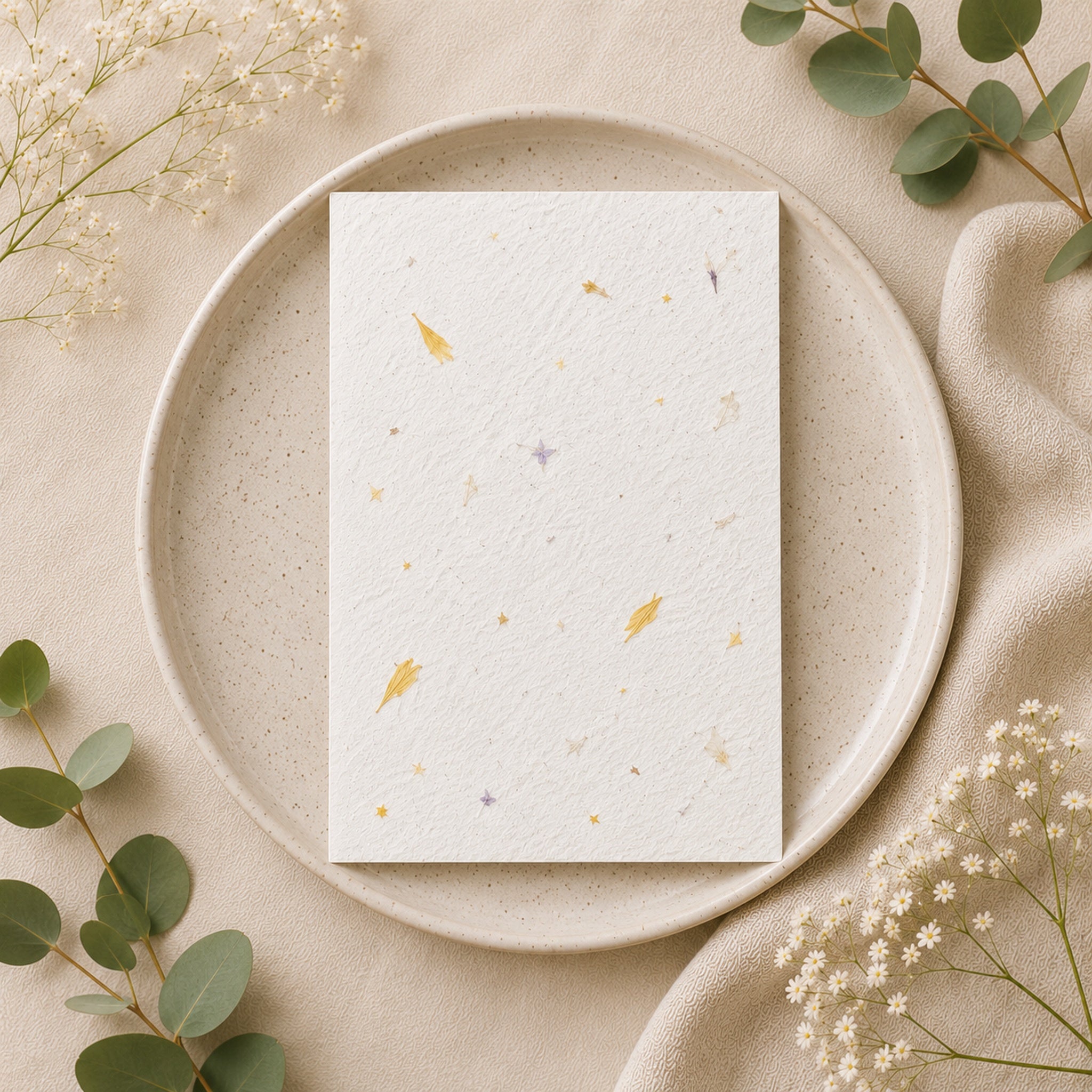 Yellow petal handmade seed paper sheet botanical flatlay